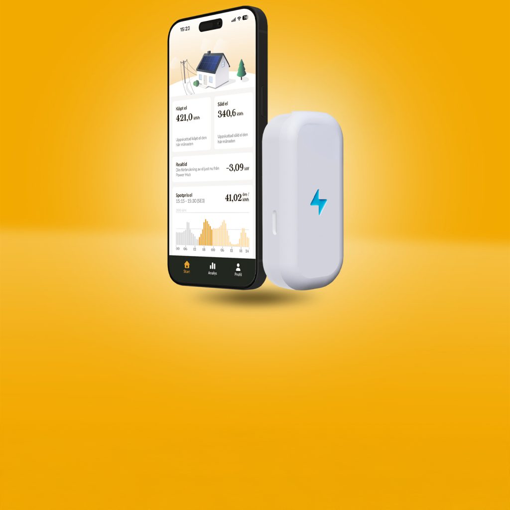 Mobiltelefon med energiapp och en vit enhet för energimätning.